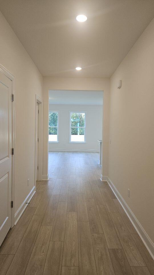 259 Huguenot Trl, Huger, SC 29450 - corridor featuring wood finished floors and recessed lighting