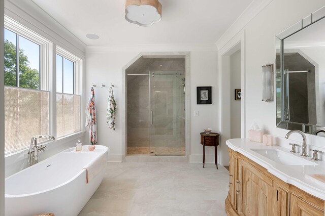 2538 Helmsman Rd, Johns Island, SC 29455 - full bath with a freestanding bath, crown molding, baseboards, a shower stall, and vanity