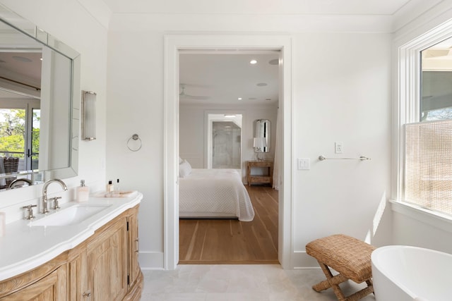2538 Helmsman Rd, Johns Island, SC 29455 - full bathroom featuring a soaking tub, connected bathroom, baseboards, and vanity