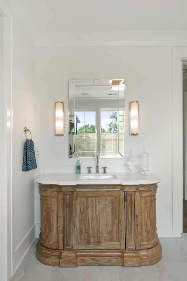 2538 Helmsman Rd, Johns Island, SC 29455 - bathroom featuring baseboards, marble finish floor, and vanity