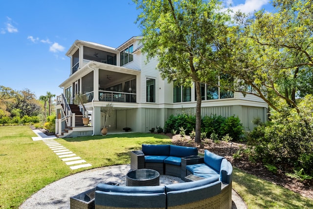 2538 Helmsman Rd, Johns Island, SC 29455 - rear view of property featuring a lawn, ceiling fan, an outdoor hangout area, a sunroom, and stairway