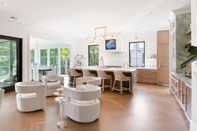 2538 Helmsman Rd, Johns Island, SC 29455 - living room with an inviting chandelier and visible vents