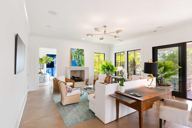 2538 Helmsman Rd, Johns Island, SC 29455 - living room with a fireplace, crown molding, a notable chandelier, and baseboards