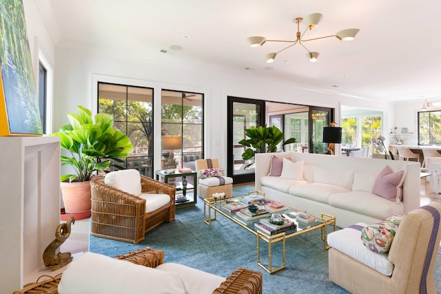 2538 Helmsman Rd, Johns Island, SC 29455 - living room with an inviting chandelier, ornamental molding, carpet, and visible vents