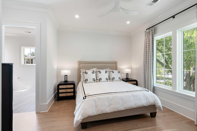 2538 Helmsman Rd, Johns Island, SC 29455 - bedroom with wood finished floors, baseboards, visible vents, and multiple windows