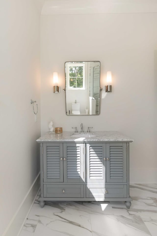 2538 Helmsman Rd, Johns Island, SC 29455 - bathroom featuring vanity, baseboards, and marble finish floor