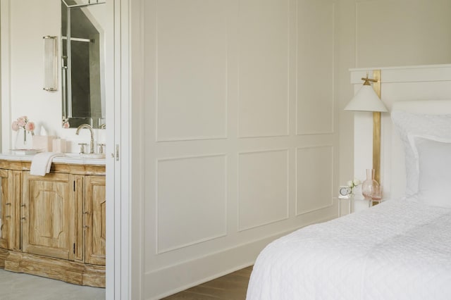 2538 Helmsman Rd, Johns Island, SC 29455 - bedroom with ensuite bath, wood finished floors, and a sink