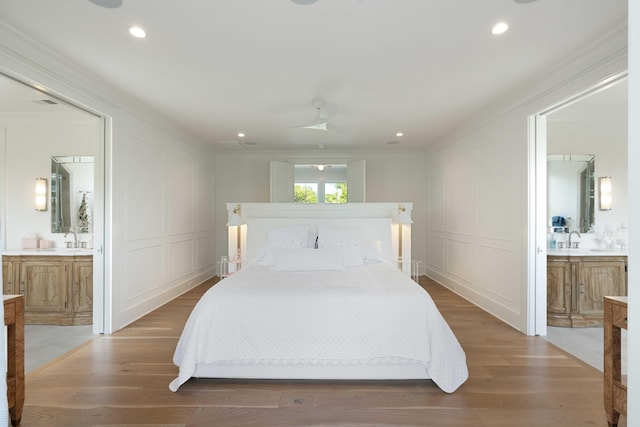 2538 Helmsman Rd, Johns Island, SC 29455 - bedroom featuring ensuite bath, a decorative wall, and crown molding