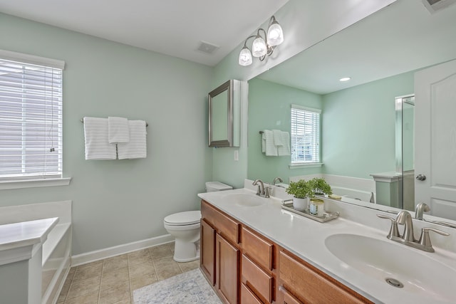 full bath with a bath, visible vents, baseboards, and a sink