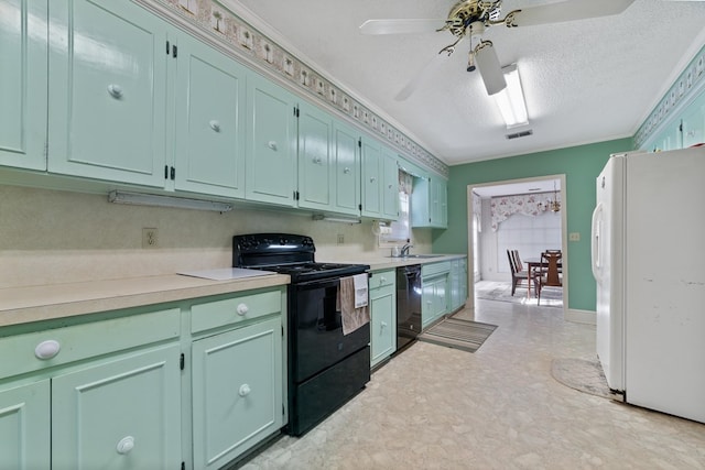 kitchen featuring crown molding, black appliances, sink, and ceiling fan