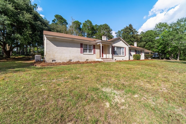 single story home with a front lawn and central AC