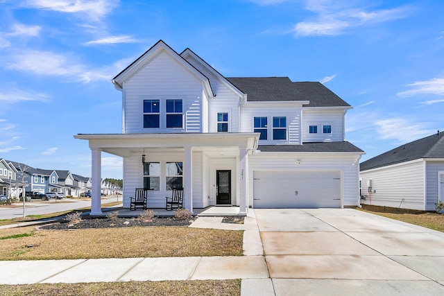 view of front of house featuring a residential view, concrete driveway, roof with shingles, covered porch, and an attached garage