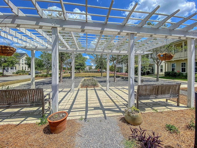 exterior space featuring a pergola