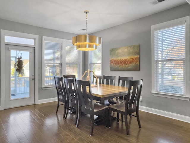 dining room featuring dark hardwood / wood-style floors