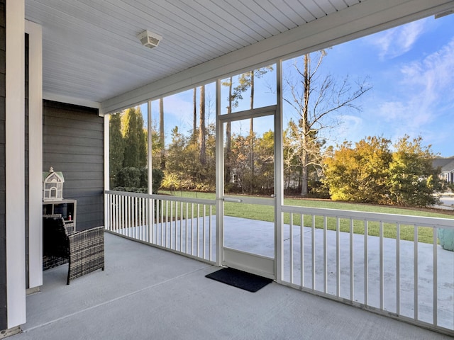 unfurnished sunroom with a healthy amount of sunlight