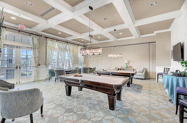 rec room with billiards, beam ceiling, coffered ceiling, ornamental molding, and french doors