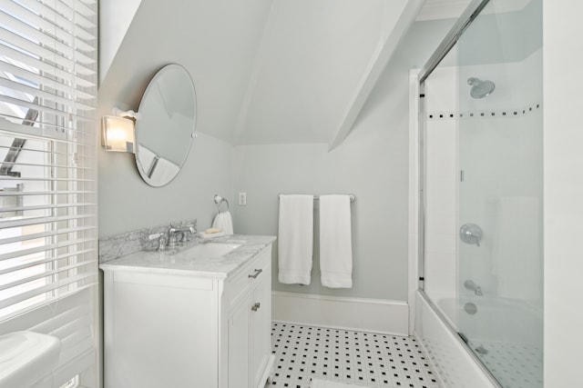 full bathroom with toilet, plenty of natural light, vanity, and enclosed tub / shower combo