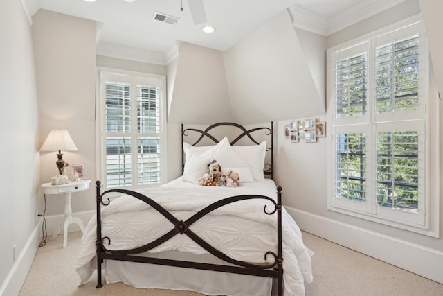 carpeted bedroom with ornamental molding, multiple windows, and ceiling fan