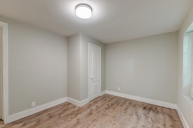 unfurnished room featuring light wood-type flooring