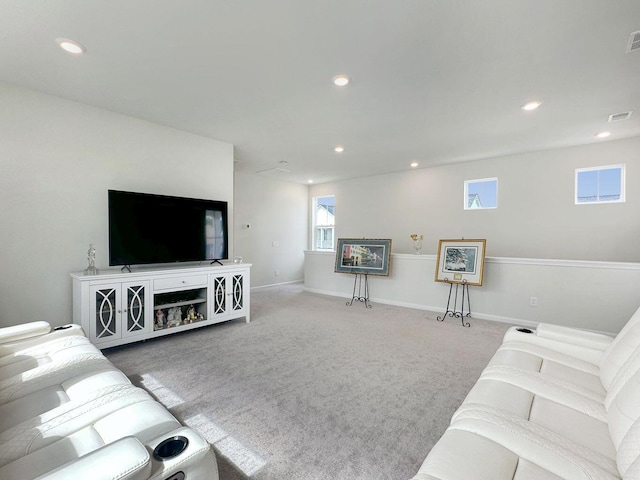 living area featuring baseboards, carpet flooring, and recessed lighting