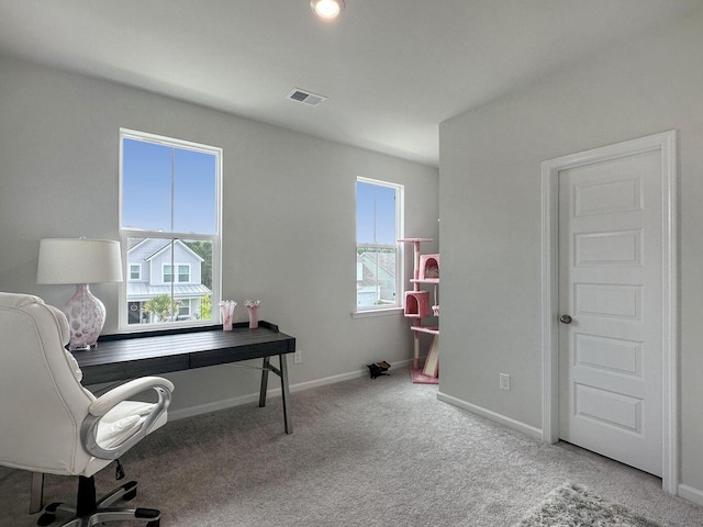 office area featuring carpet, visible vents, and baseboards