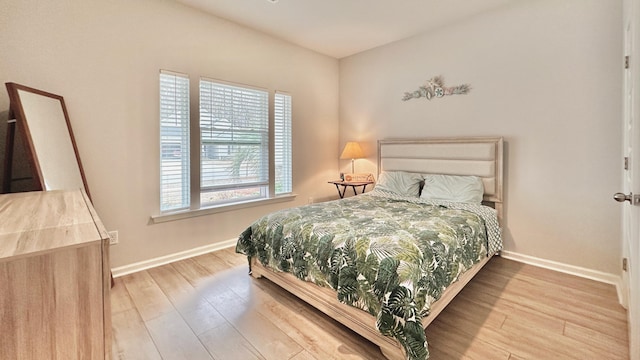 bedroom featuring light hardwood / wood-style floors