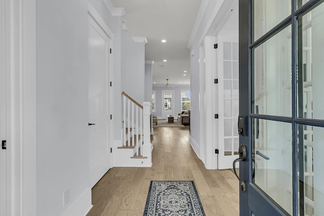 1182 Welcome Dr, Mount Pleasant, SC 29464 - entryway featuring light wood-style flooring, stairs, recessed lighting, and french doors