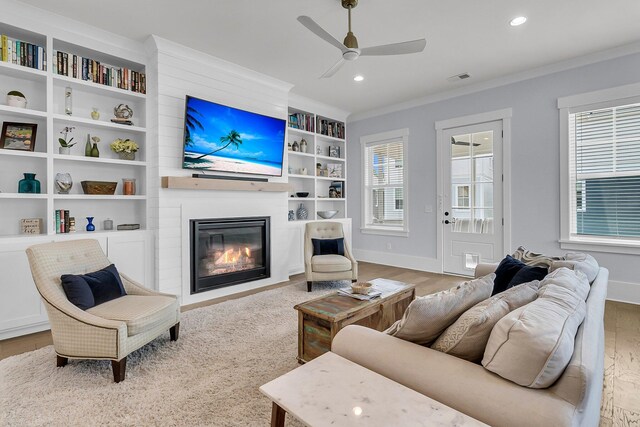 1182 Welcome Dr, Mount Pleasant, SC 29464 - living room featuring ornamental molding, a fireplace, baseboards, ceiling fan, and recessed lighting