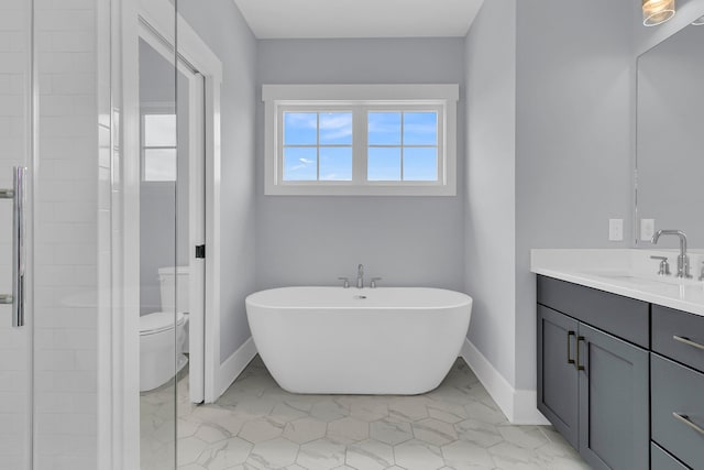 1182 Welcome Dr, Mount Pleasant, SC 29464 - full bath with vanity, a soaking tub, baseboards, and toilet