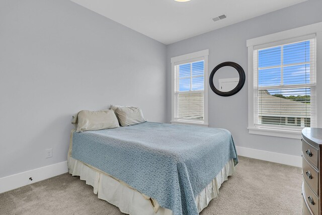 1182 Welcome Dr, Mount Pleasant, SC 29464 - bedroom featuring light colored carpet and baseboards