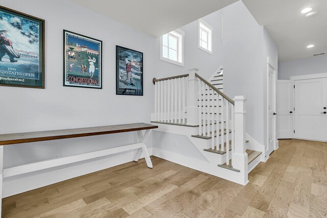 1182 Welcome Dr, Mount Pleasant, SC 29464 - stairway with wood finished floors, recessed lighting, and baseboards