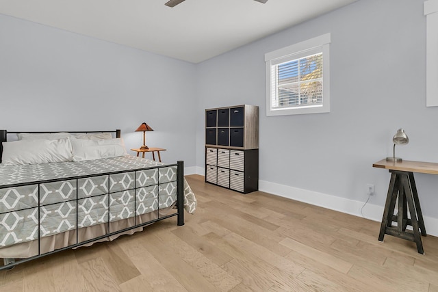 1182 Welcome Dr, Mount Pleasant, SC 29464 - bedroom with wood finished floors, baseboards, and a ceiling fan
