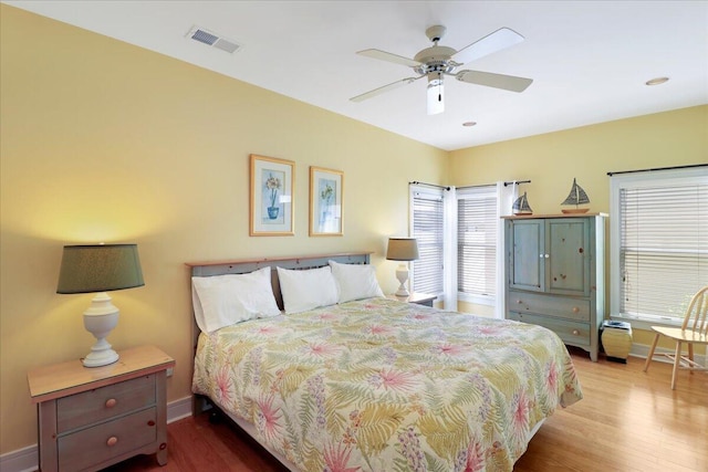 103 Grand Pavilion Blvd, Isle Of Palms, SC 29451 - bedroom with wood finished floors, visible vents, baseboards, and ceiling fan