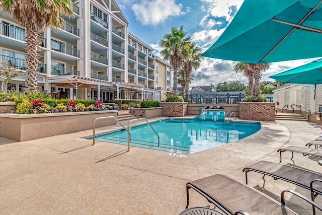 103 Grand Pavilion Blvd, Isle Of Palms, SC 29451 - pool with a patio area