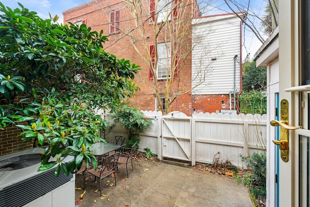 view of patio featuring central AC