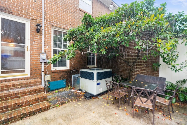 view of patio featuring cooling unit