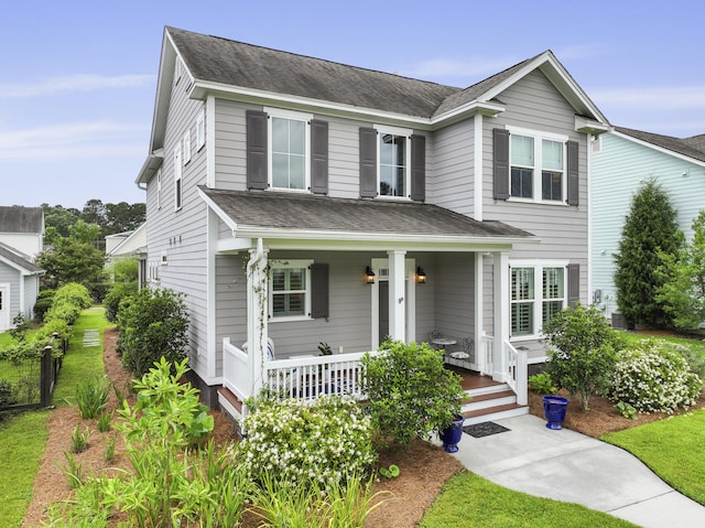 3998 Capensis Ln, Ravenel, SC 29470 - view of front of home featuring a porch and roof with shingles