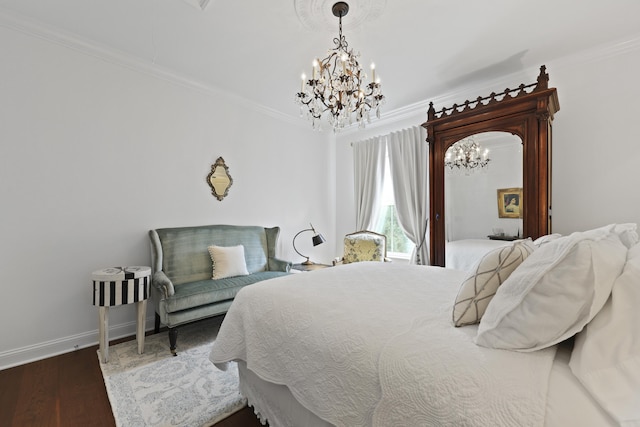 3998 Capensis Ln, Ravenel, SC 29470 - bedroom with a chandelier, crown molding, wood finished floors, and baseboards