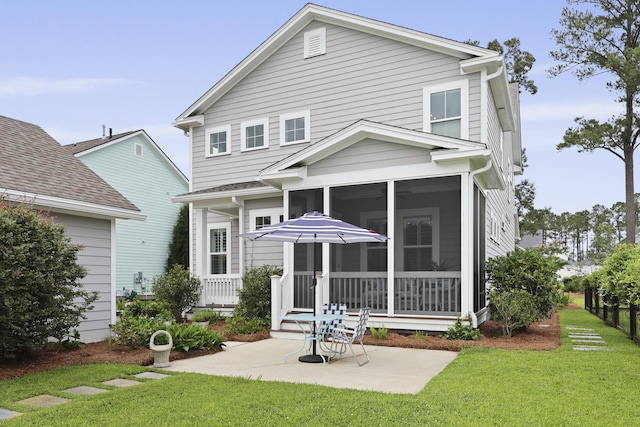 3998 Capensis Ln, Ravenel, SC 29470 - back of house featuring a patio area and a sunroom
