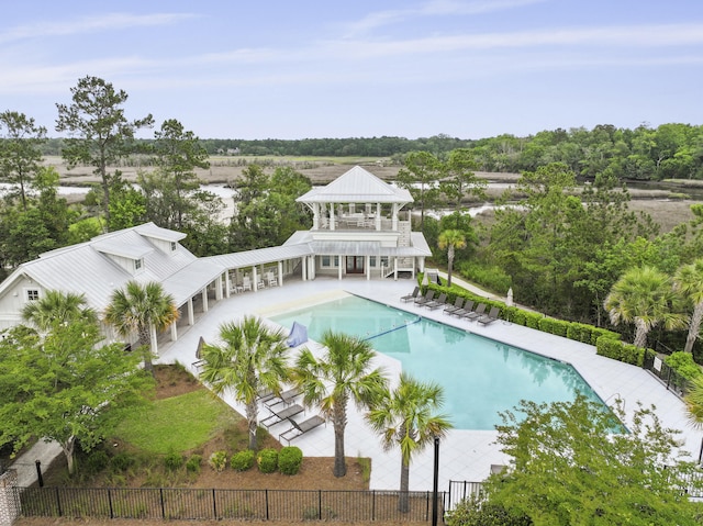 3998 Capensis Ln, Ravenel, SC 29470 - community pool with a patio and view of scattered trees