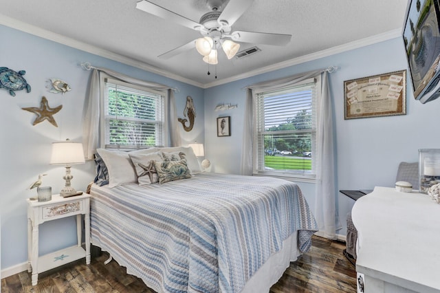 414 Birch Ave, Goose Creek, SC 29445 - bedroom with dark wood finished floors, crown molding, ceiling fan, and a textured ceiling
