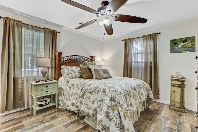 414 Birch Ave, Goose Creek, SC 29445 - bedroom featuring wood finished floors, crown molding, and a ceiling fan