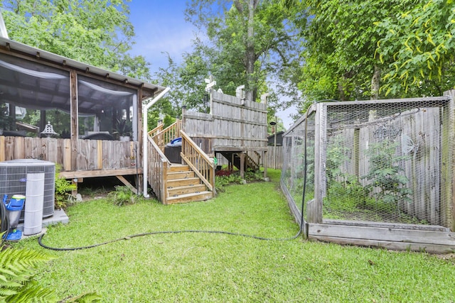 414 Birch Ave, Goose Creek, SC 29445 - fenced backyard with a sunroom and a wooden deck