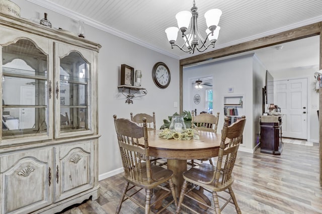414 Birch Ave, Goose Creek, SC 29445 - dining room featuring a chandelier, light wood-type flooring, crown molding, and a ceiling fan