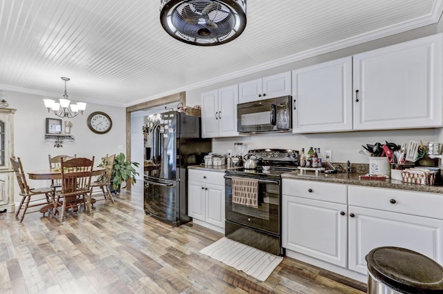 414 Birch Ave, Goose Creek, SC 29445 - kitchen with black appliances, a chandelier, crown molding, white cabinetry, and light wood-style flooring