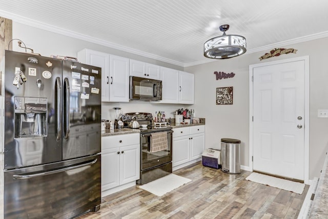 414 Birch Ave, Goose Creek, SC 29445 - kitchen featuring black appliances, white cabinetry, crown molding, light wood-type flooring, and light stone counters