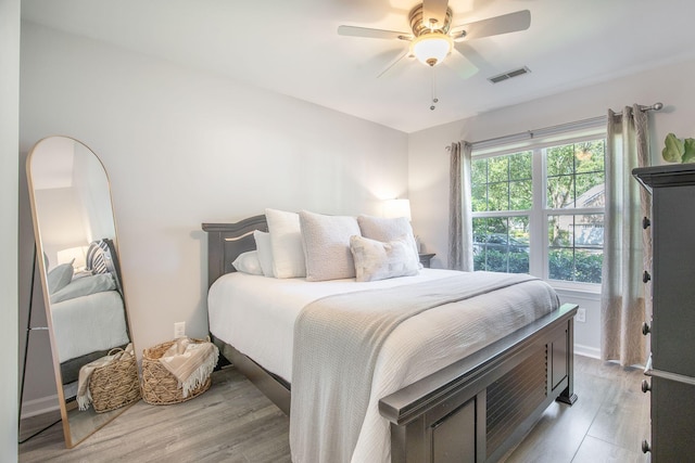 512 Castle Hall Rd, Mount Pleasant, SC 29464 - bedroom featuring light wood finished floors and a ceiling fan