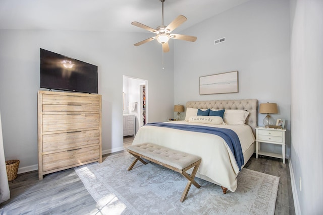 512 Castle Hall Rd, Mount Pleasant, SC 29464 - bedroom with wood finished floors, baseboards, high vaulted ceiling, connected bathroom, and ceiling fan