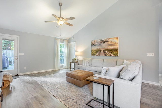 512 Castle Hall Rd, Mount Pleasant, SC 29464 - living area featuring wood finished floors, healthy amount of natural light, ceiling fan, high vaulted ceiling, and baseboards