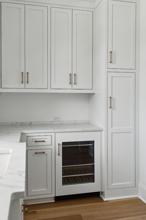 1479 Jeremy Cay Ct, Awendaw, SC 29429 - bar featuring wood finished floors and beverage cooler